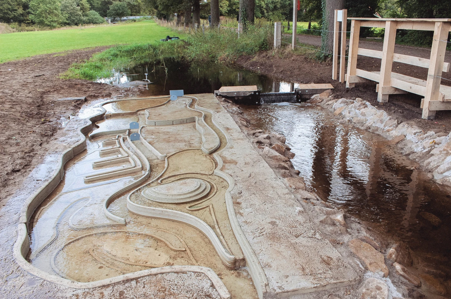 The installed concrete model with winding waterways, locks and stepped terrain