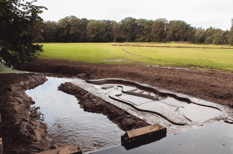 The concrete waterways integrated into the wetland landscape at Lankheet Estate